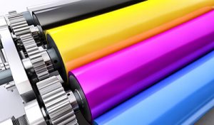 CMYK rollers on a printer | Print Media For Law Firms